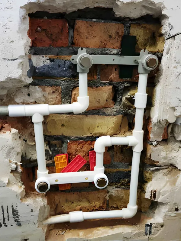 Plumber repairing pipe