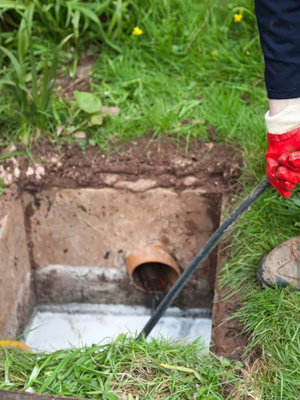 Plumber repairing pipe